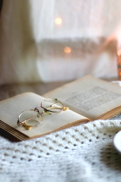 istock Chocolate, Cookies, Book, Glasses and Blanket 1368007279