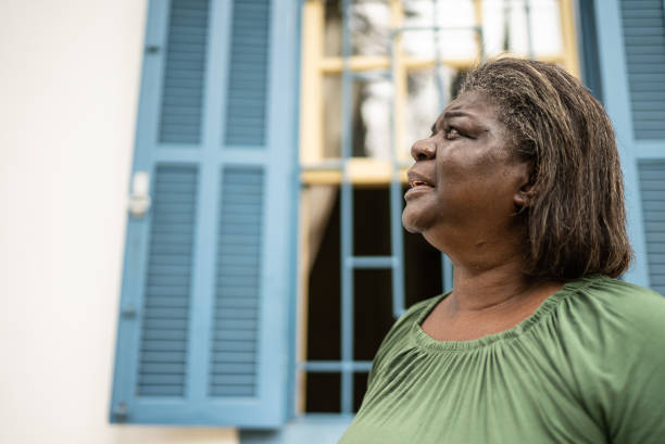 Senior woman looking up outdoors