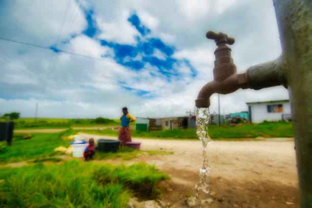Water running out of a faucet in a rural area in Africa