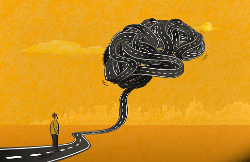 The man standing on a road and looking at the big brain-shaped knot formed by tangled roads. (Used clipping mask)