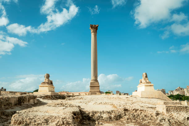 istock Ancient column and sphinx on hill, Alexandria, Egypt 1368012365