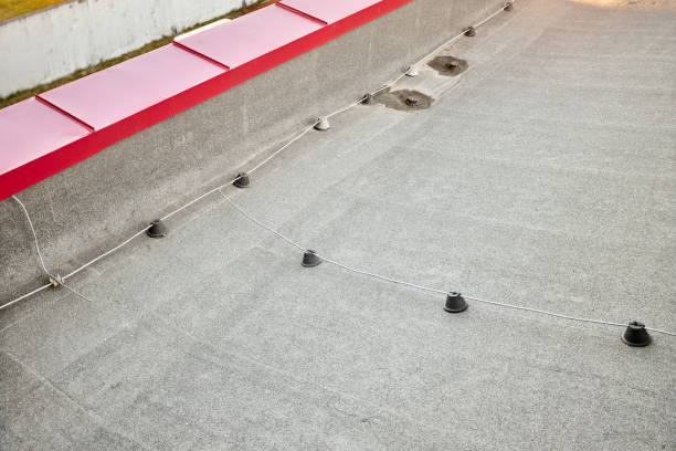 istock Lightning protection system. Lightning protection components conductors connections bolts grounded on rooftop of commercial industrial building. 1368015652
