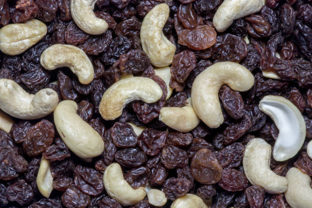 istock Cashew Nuts and Raisins Mixture Closeup View 1368016067