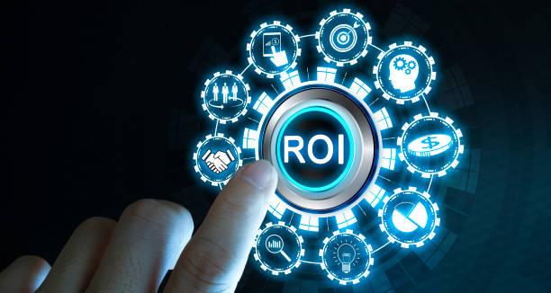 istock Businessman's fingers pressing a button ROI. 1368016161