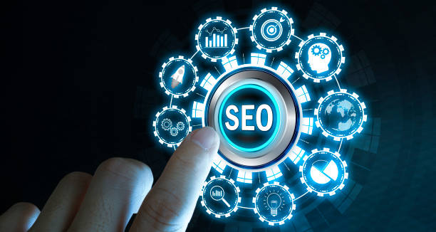 istock Businessman's fingers pressing a button SEO. 1368016169