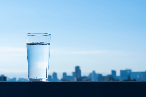 A glass of water placed outdoors