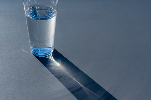 A glass of water placed outdoors