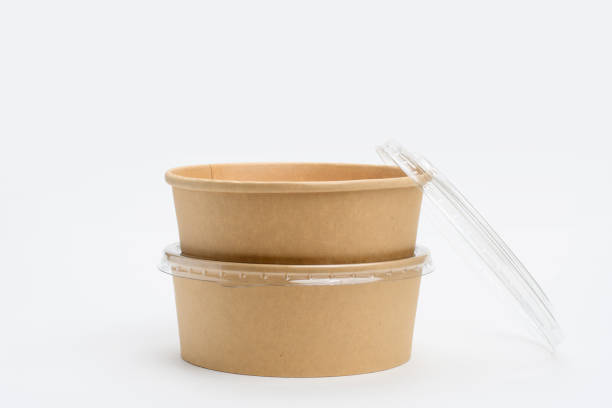 istock Two paper containers for food of different sizes on a white background with an open lid. 1368017022