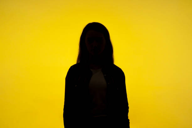 No name, anonymous person hiding face in shadow, human identity