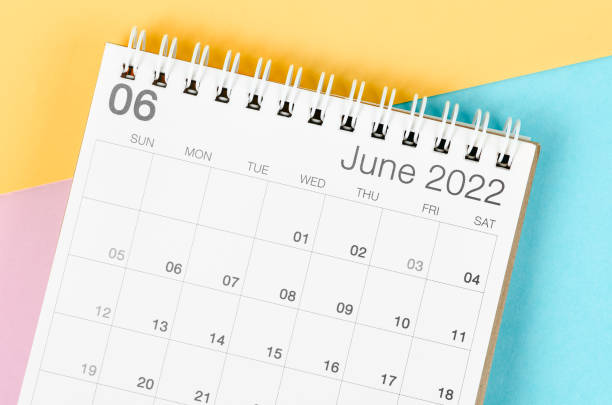 istock June 2022 desk calendar on multicolored background. 1368022877