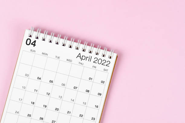 istock April 2022 desk calendar on pink background with empty space. 1368022881