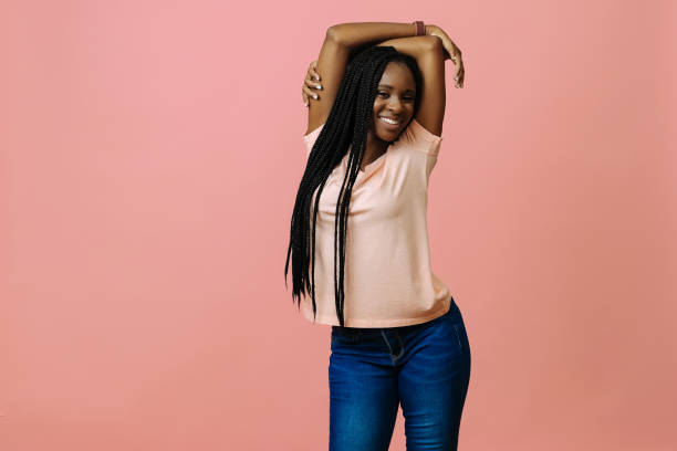 istock Beautiful young woman dancing 1368024439
