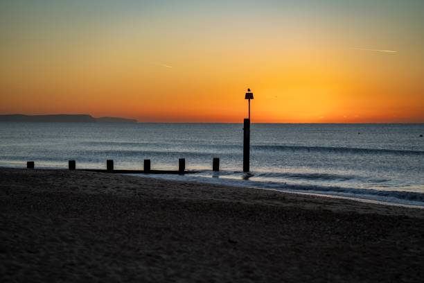istock Sunrise on the beach in Bournemouth Dorset 1368024643