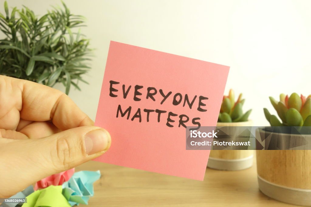 Words everyone matters handwritten on sticky note Words everyone matters handwritten on sticky note. Equality for all, diversity and tolerance concept Respect Stock Photo