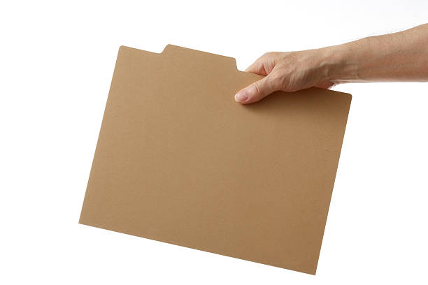 istock Isolated shot of holding a file folder against white background 136802821