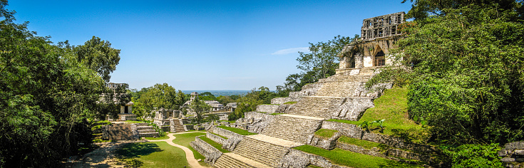 The Temple of the Cross pyramid, in the foreground, is one of the biggest known structures of the ancient Maya City of Palenque, located in Mexico's southern state of Chiapas. After its abandonment, it was slowly absorbed into the jungle, before being rediscovered hundreds of years later.
Despite extensive excavations in the past decades, archeologist estimate that less than 10% of the site has been explored so far, and that over a thousand buildings are still buried.