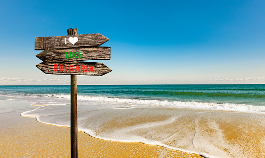 Signpost on the sandy beach at Golden Sands on the Bulgarian Black Sea coast
