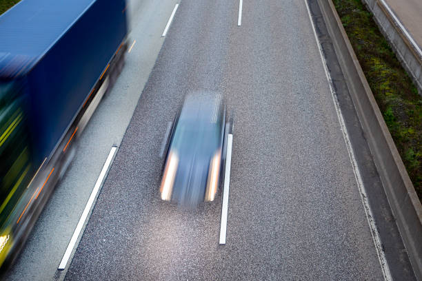 istock German autobahn - view from a bridge at dusk, motion blur 1368033435