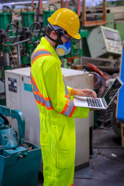 istock Blue collar worker at factory. 1368034137