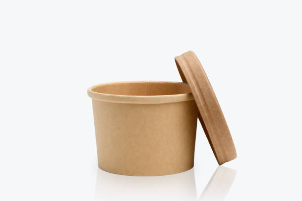 Paper container with lid. The concept of using utensils made of biodegradable materials for food delivery.
