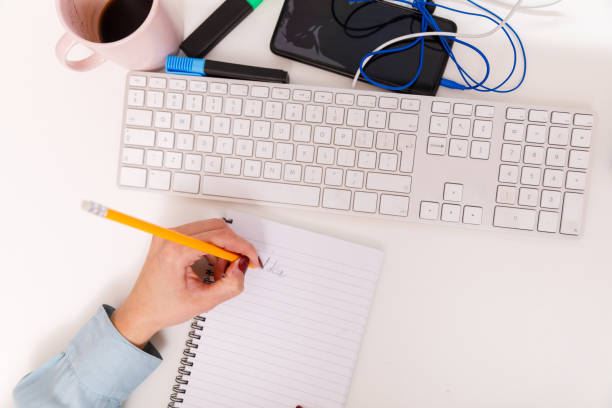 istock Writing a to do list for a work day 1368037225