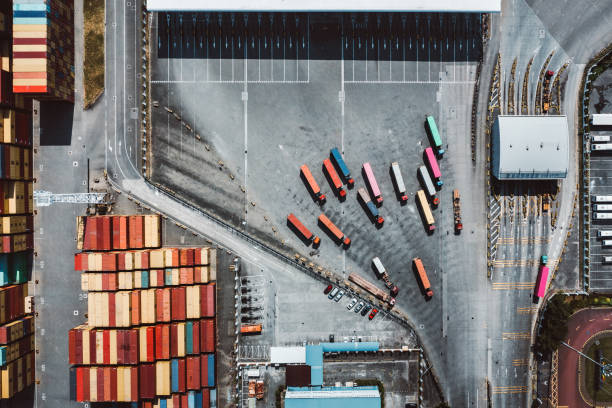istock Top View of container ship terminal with trucks in Shenzhen, China 1368040729