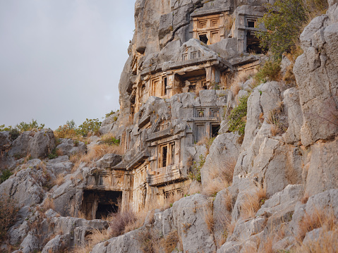 Archeological remains of the Lycian rock cut tombs in Myra, city Demre in Turkey. unique ancient necropolis.