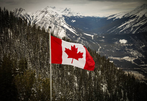 istock Canada flag in the Rocky Mountains. 1368041397