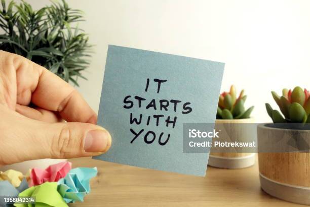 Words It Starts With You Handwritten On Sticky Note Business Planning Concept Stock Photo - Download Image Now