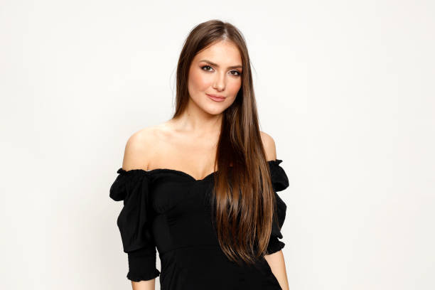 istock Attractive brunette girl is posing in studio. 1368043707