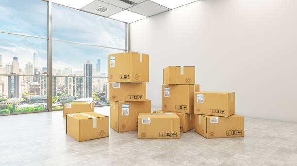 Moving To New Office Concept with Cardboard Boxes stock photo