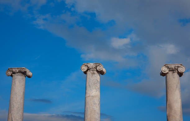 walk in Antalya Turkey on warm October afternoon, city Perge. view of the columns against the blue sky