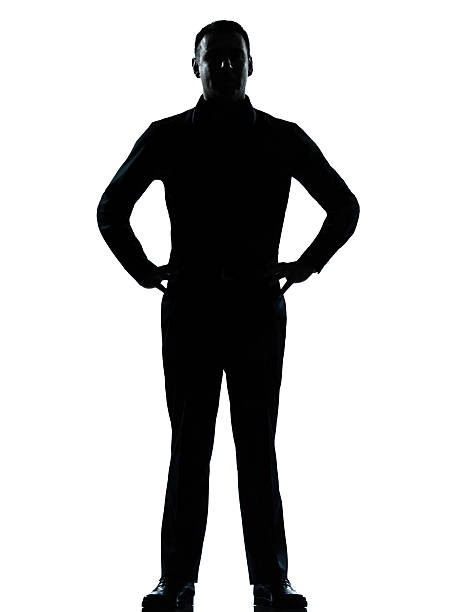 istock one business man standing hands on hips silhouette 136804757