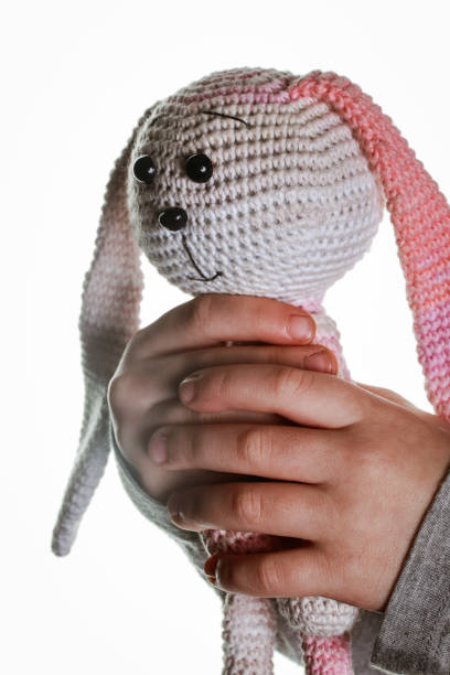 istock hand-knitted toy pink and white bunny 1368053068