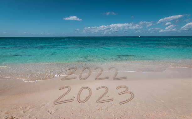 istock New Year 2023 on the beach. 1368054199