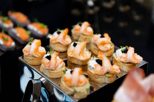 istock Little shrimp sandwiches. Snacks Snacks. serving at the party 1368055109