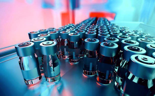Close-up of medicine vials on a production line stock photo