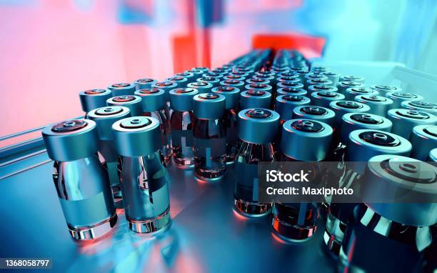 Closeup Of Medicine Vials On A Production Line Stock Photo - Download Image Now - Medicine, Pharmaceutical Industry, Manufacturing