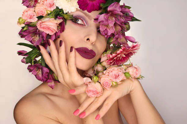 istock Burgundy pink manicure and makeup . 1368059635