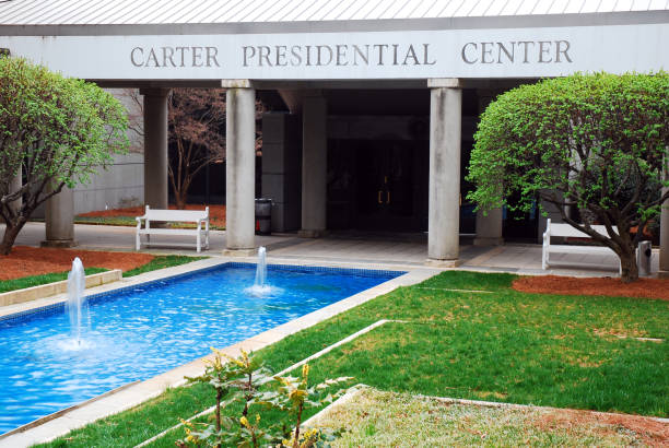 Atlanta, GA, USA February 27 A small reflecting pool and fountains stand in front of the President James Carter Library in Atlanta