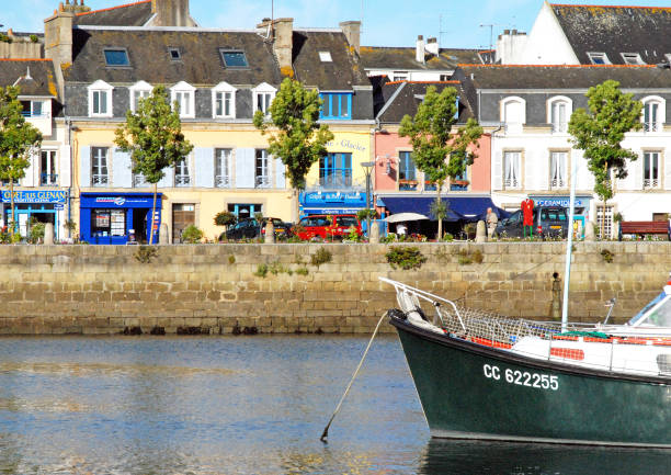 Quiet quayside view, Port de Plaisance, Benodet, Brittany, France. Benodet is a coastal village and port on the Brittany coast of France, popular for sailing and motorboating as well as being a tourist resort