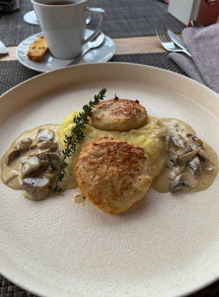 istock Mashed potatoes and chicken cutlets with mushroom sauce 1368060210