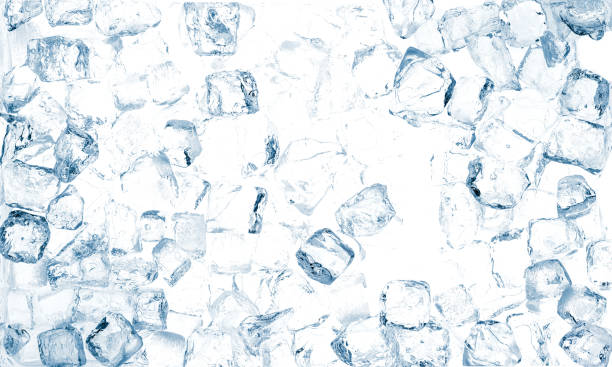 istock Scattered natural blue-toned ice cubes on white background. 1368061041