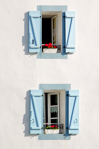 Greek traditional white and blue house close-up door and window view