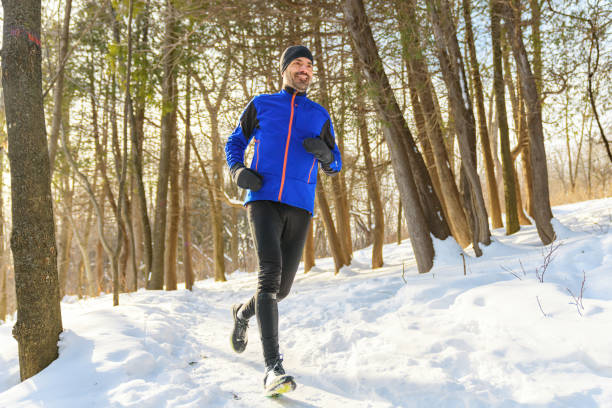 istock mature man running at winter in park 1368062886