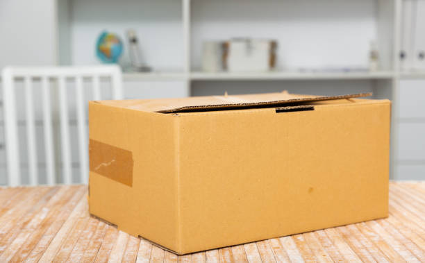 istock One cardboard box on top of table 1368063418