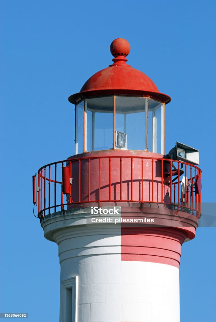 Lighthouse tower top, France Lighthouse lantern top and hood with railings, glass and warning horn, Ile de Groix, Morbihan, Brittany, France Morbihan Stock Photo