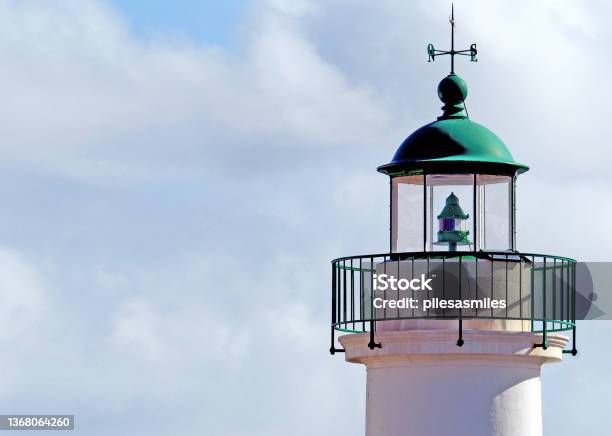 Lighthouse Tower Top And Cloudscape Sauzon Harbour Belle Ile France Stock Photo - Download Image Now
