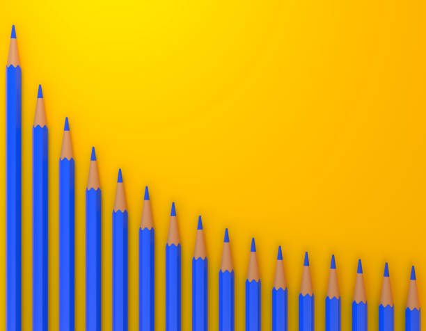 istock Blue pencils on technical chart of financial expansion. Wave pattern row on yellow background 1368064358