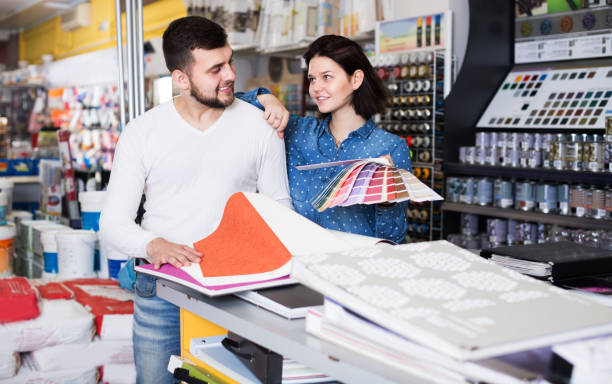 istock Couple in paint supplies store 1368065634